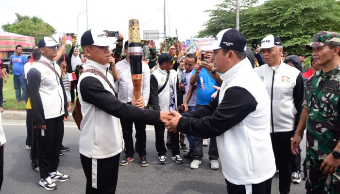 Masyarakat Sambut Meriah Kirab Api PON XXI di Lubuk Pakam