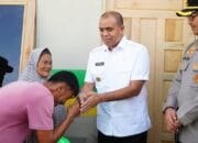 Bukti Nyata Gotong Royong, Pj Bupati Didampingi Kapolres Langkat Serahkan Rumah Baru Korban Kebakaran