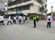 Polres Tanjung Balai Kawal dan Amankan Pawai Ta’aruf Pembukaan MTQ ke-57 Kota Tanjung Balai